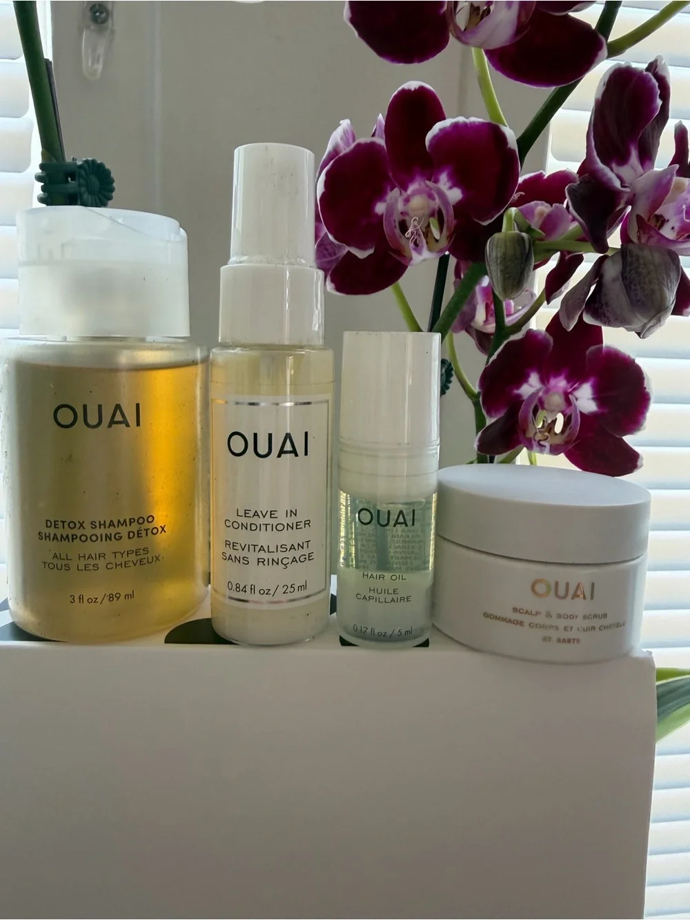 OUAI Travel Skincare & Hair Mini Set — Clear and Gold Accents